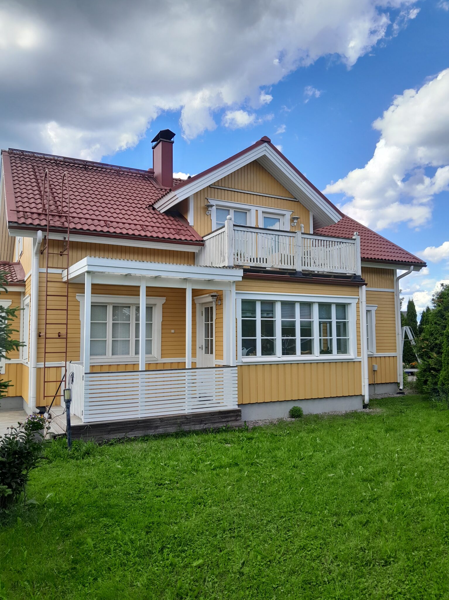 Omakotitalon puujulkisivut